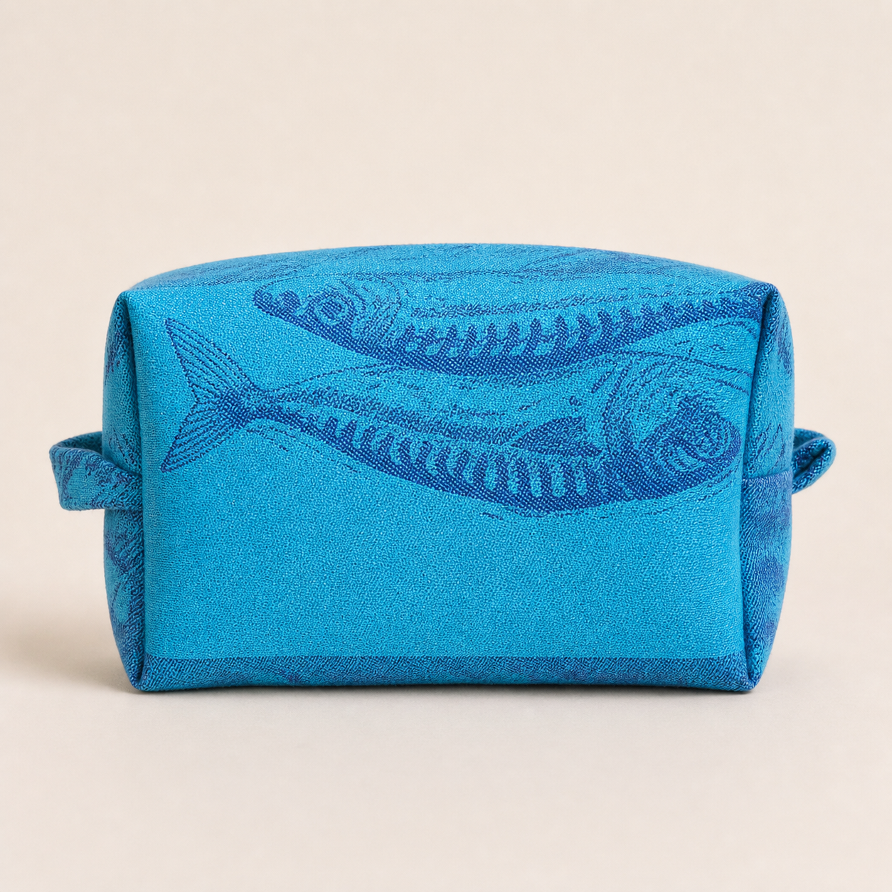 Jacquard Kitchen Towel Pouch made from bright aqua jacquard textile on a clean studio background.